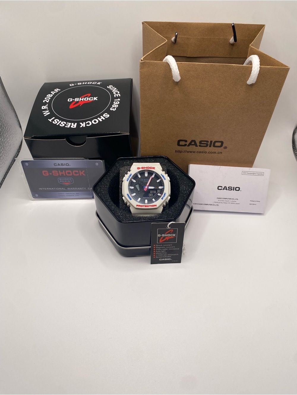 Casio G-Shock White and Black Sport Watch with Red Accents
